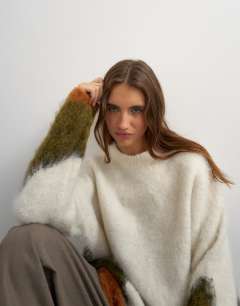 Model wearing Knitted hairy abstract colour block stripe crew neck jumper in ivory multi