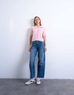 Model wearing Knitted half sleeve collared cardigan in light pink