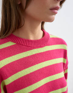 Model wearing Knitted half sleeve relaxed fit t-shirt in pink and lime