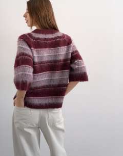 Model wearing Knitted half sleeve stripey t-shirt in burgundy