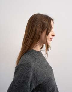 Model wearing Knitted half sleeve t-shirt in charcoal
