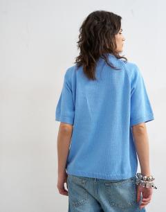 Model wearing Knitted half sleeve t-shirt in cornflower blue