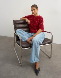 Model wearing Knitted half sleeve v neck sequin t-shirt in red