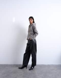 Model wearing Knitted heavy twist yarn hoodie in grey