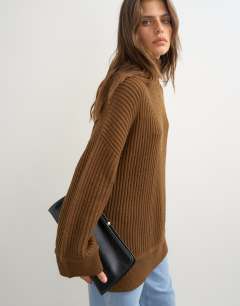 Model wearing Knitted high neck roll seam detail oversized jumper with wool in pecan