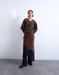 Model wearing Knitted high v horizontal stitch jumper in brown