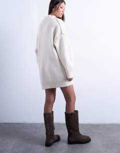 Model wearing Knitted high V-neck mini oversized dress in ivory