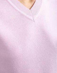 Model wearing Knitted high v neck top in pink