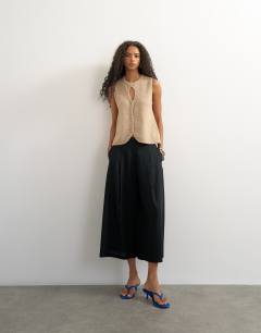 Model wearing Knitted key hole tank top in stone