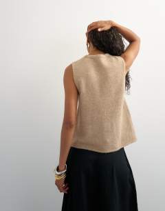 Model wearing Knitted key hole tank top in stone