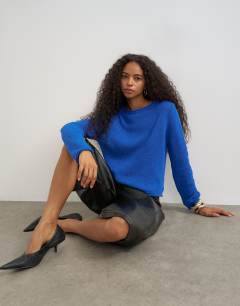 Knitted long sleeve top with roll hem trims in blue