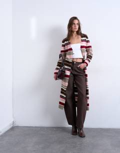 Model wearing Knitted longline stripe cardigan in multi