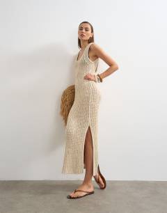 Model wearing Knitted low scoop crochet maxi dress in neutral stone