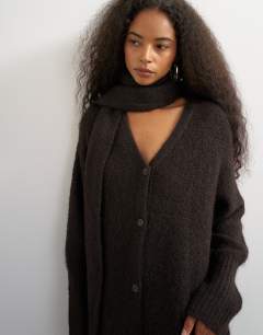 Model wearing Knitted maxi cardigan with button detail in tobacco
