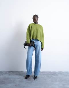 Model wearing Knitted mid ultimate jumper in green