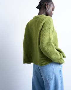 Model wearing Knitted mid ultimate jumper in green