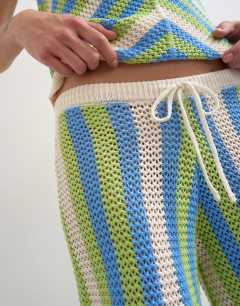 Model wearing Knitted mix stripe co-ord longline jort in green and blue multi