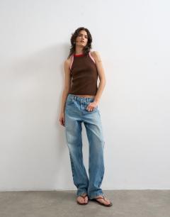 Model wearing Knitted multi colour trim racer vest in brown