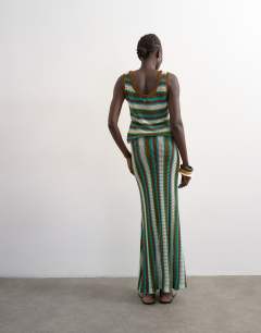 Model wearing Knitted multi stripe co-ord maxi skirt in blue and brown