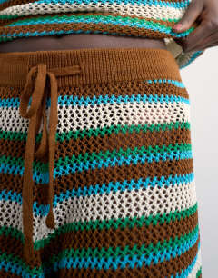 Model wearing Knitted multi stripe co-ord short in blue and brown