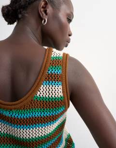 Model wearing Knitted multi stripe co-ord vest in blue and brown