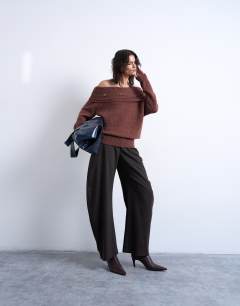 Model wearing Knitted off shoulder button detail top in brown