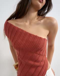 Model wearing Knitted one shoulder asymmetric top in rust