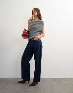Model wearing Knitted one shoulder draped top in grey