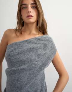 Model wearing Knitted one shoulder draped top in grey