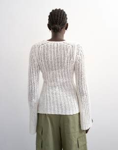 Model wearing Knitted open stitch long sleeve top in ivory