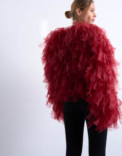 Model wearing Knitted organza extreme texture cardigan in burgundy