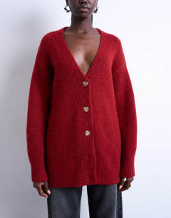 Model wearing Knitted oversized boyfriend longline easy cardigan in red