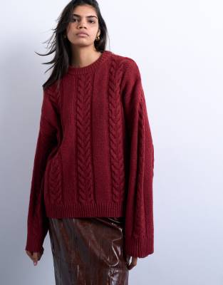 Knitted oversized cable and wide rib jumper in deep red