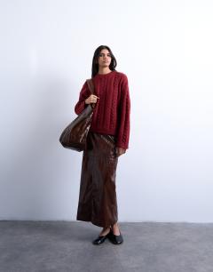 Model wearing Knitted oversized cable and wide rib jumper in deep red 