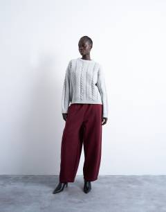 Model wearing Knitted oversized cable and wide rib jumper in grey