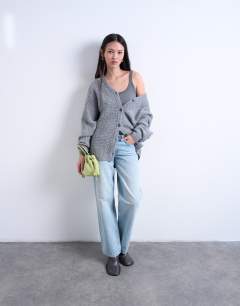 Model wearing Knitted oversized cable sleeve slouchy cardigan in grey