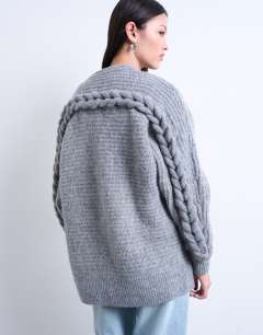 Model wearing Knitted oversized cable sleeve slouchy cardigan in grey