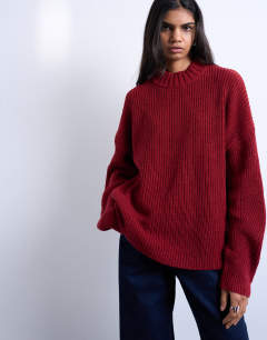 Model wearing Knitted oversized clean wide neck rib jumper in rust