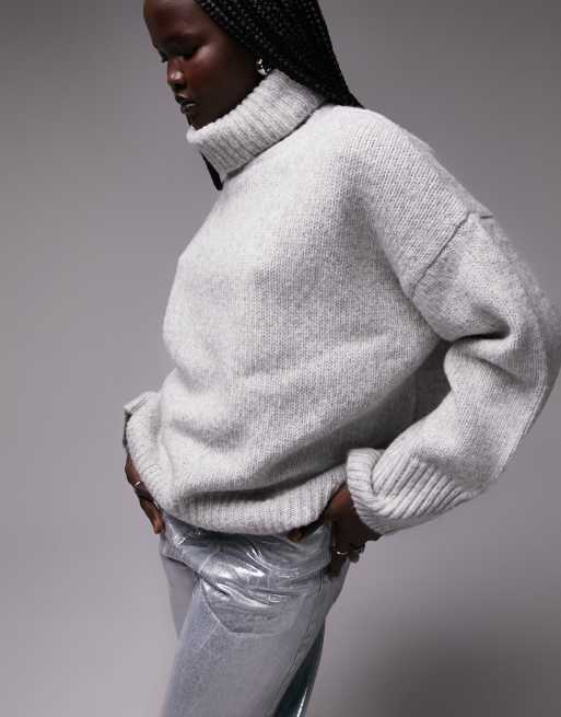 Oversized grey roll outlet neck jumper