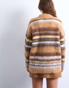Model wearing Knitted oversized stripe jumper in neutral