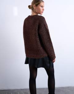 Model wearing Knitted oversized tinsel wide sleeve jumper in brown