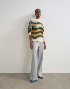 Model wearing Knitted painted stripe crew neck jumper in multi