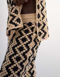 Model wearing Knitted patterned crochet co-ord trouser in black and beige