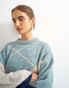 Model wearing Knitted placement argyle jumper in multi 