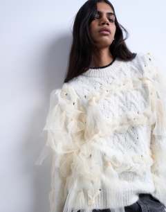 Model wearing Knitted plaid ribbon jumper in Ivory