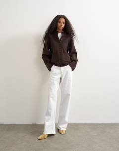 Model wearing Knitted pocket front cardigan in brown