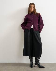 Model wearing Knitted pocket front cardigan in mulberry