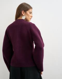 Model wearing Knitted pocket front cardigan in mulberry