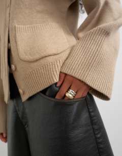 Model wearing Knitted pocket front cardigan in oat