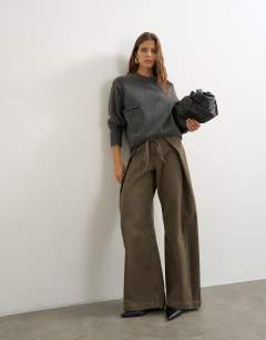 Model wearing Knitted pocket jumper in smoke